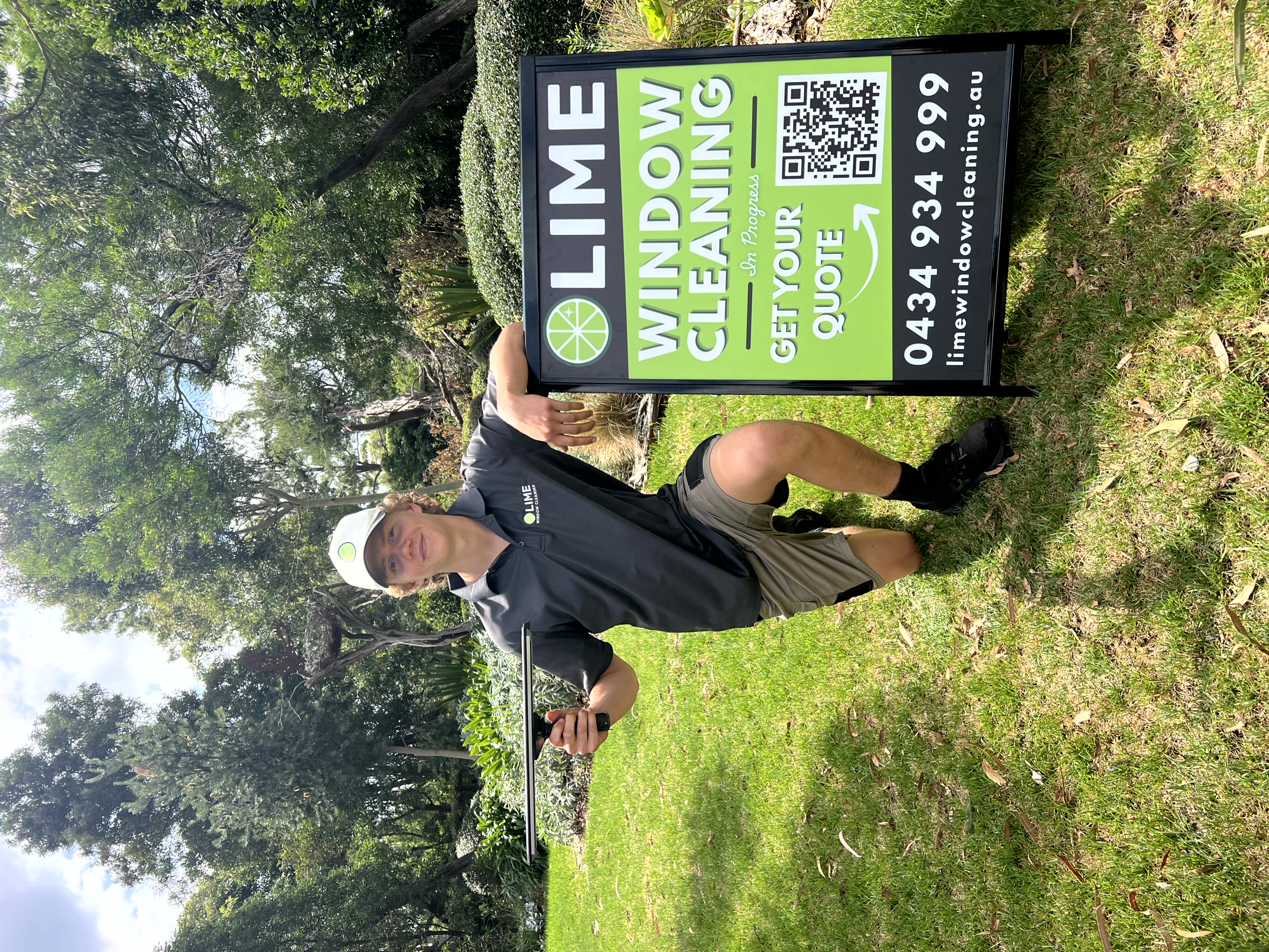 Lachie, owner of Lime Window Cleaning, in uniform